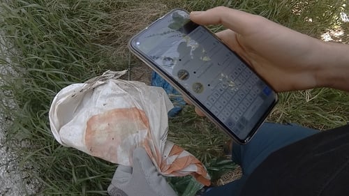 collection of litter in stream